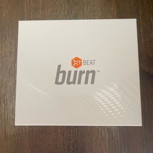 Orange theory wrist band with charger and extra strap